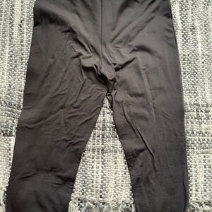 Woman Leggings, coated in the front.
